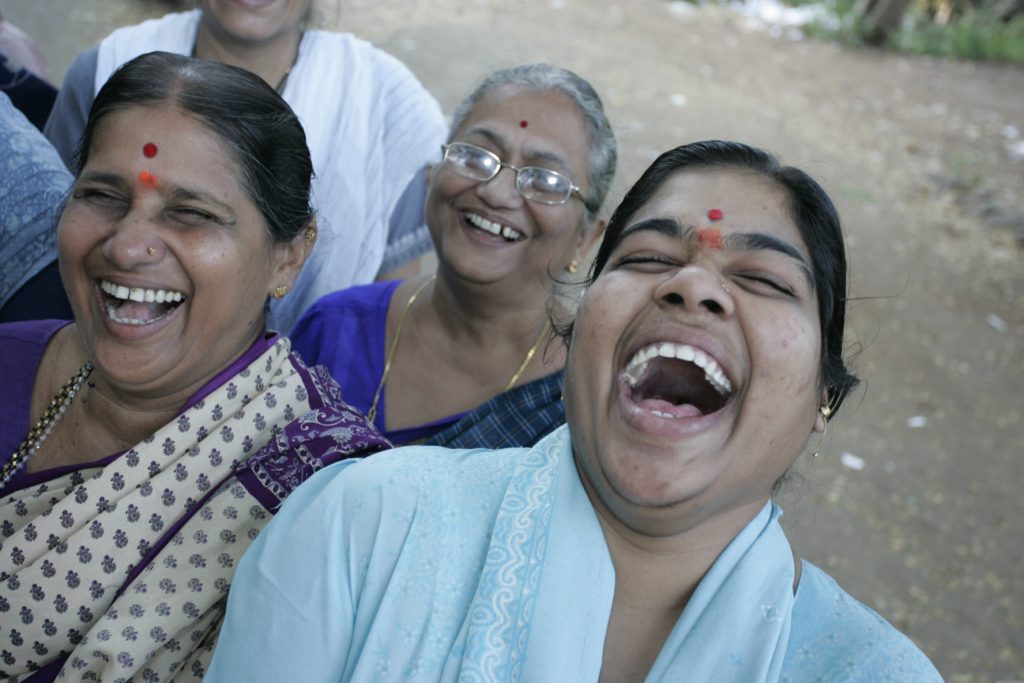 Sushma Palav regulary gets into fits of hysterics during her Laughter Yoga session in a north Mumbai park, India. "My good mood lasts me all day long" she tells me. Mumbai, India. 27/10/06